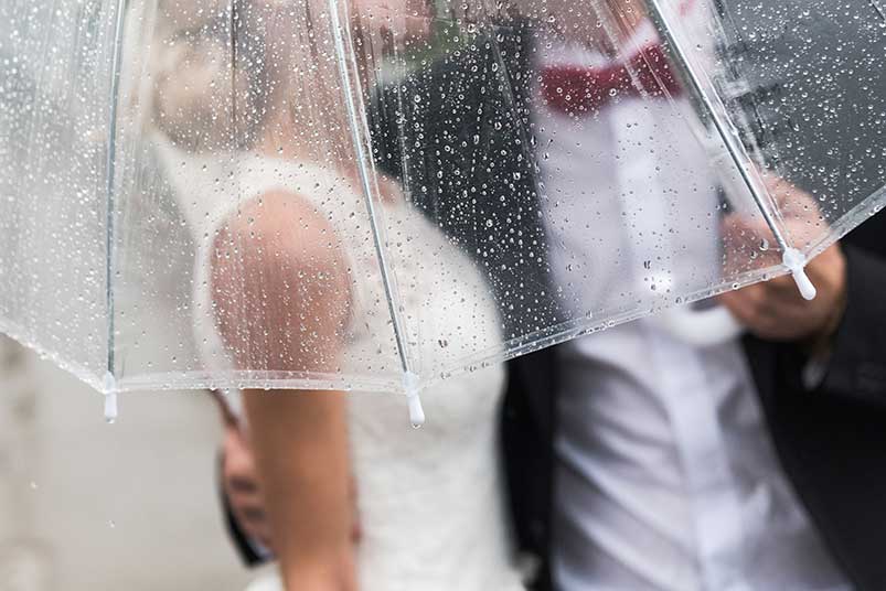 it's a rainy wedding