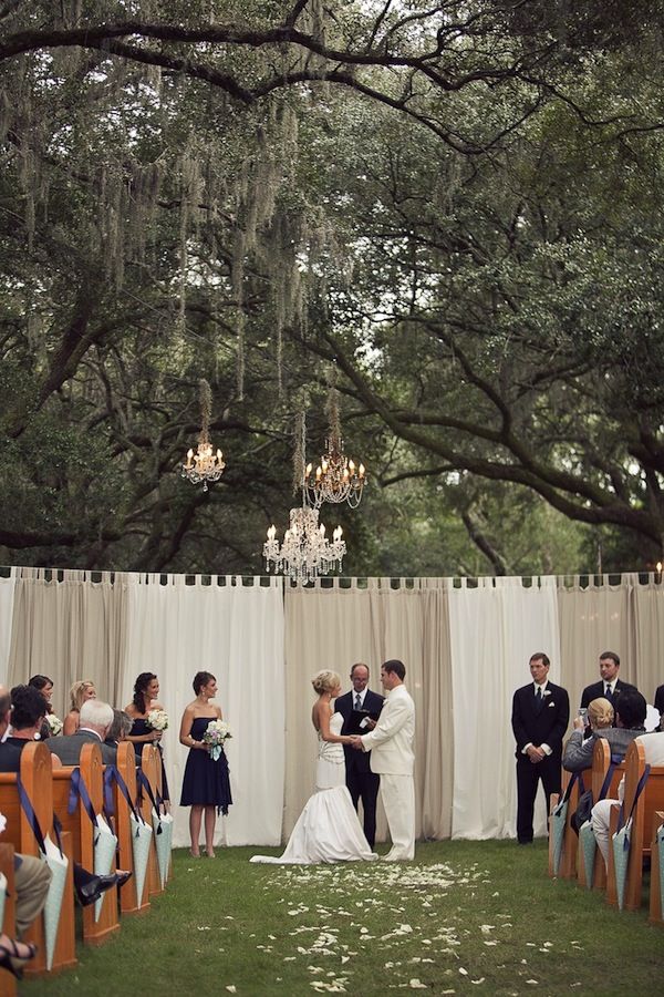 curtains and chandeliers in trees weddingfor1000.com
